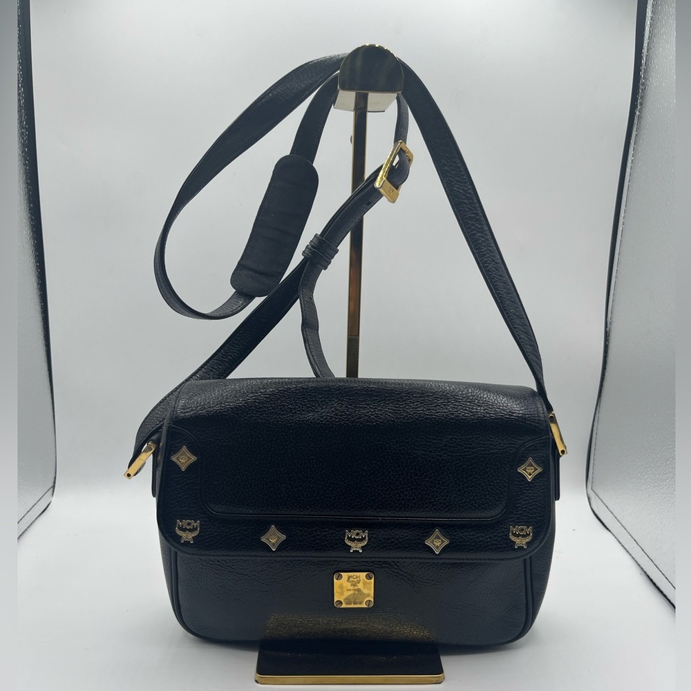 MCM black pebble Leather Crossbody Bag with Gold Accents and adjustable strap
